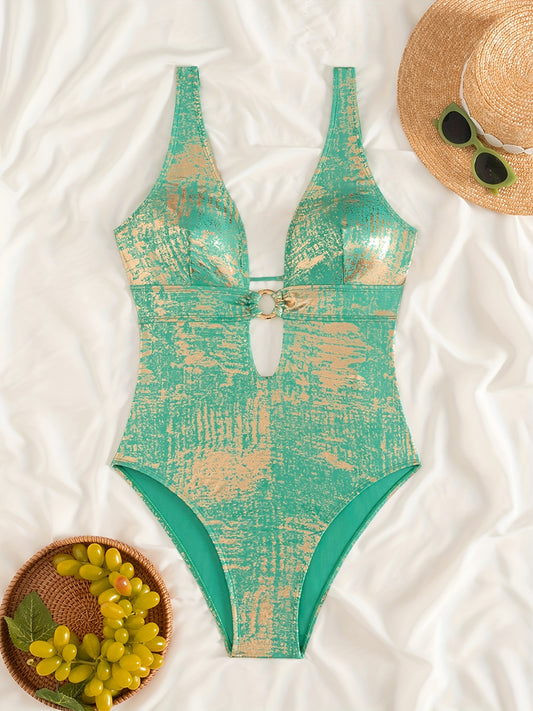 Trendy swimsuit in shiny fabric with a sexy deep V-neck and a bare back with a bow.